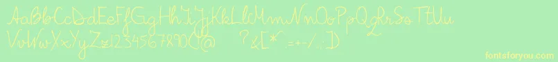 フォントBilius – 黄色の文字が緑の背景にあります