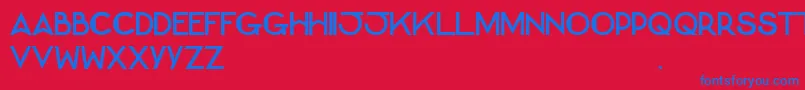 BernadetteCaps-fontti – siniset fontit punaisella taustalla