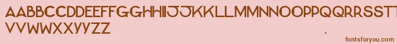 BernadetteCaps-fontti – ruskeat fontit vaaleanpunaisella taustalla