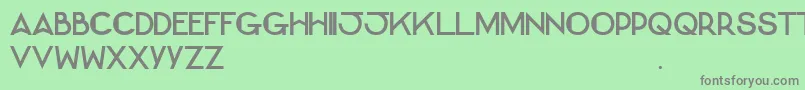 Weitere Informationen zur BernadetteCaps-Schriftart BernadetteCaps-Schriftart – Graue Schriften auf grünem Hintergrund