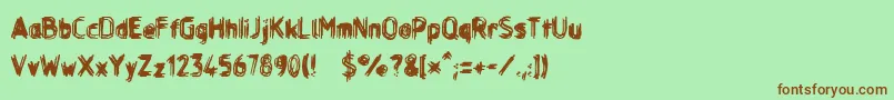 Layerreg Font – Brown Fonts on Green Background