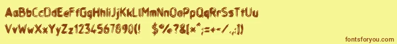 Layerreg Font – Brown Fonts on Yellow Background