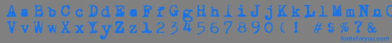 フォントDraconiantypewritter001 – 灰色の背景に青い文字