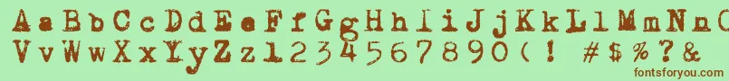 Draconiantypewritter001-fontti – ruskeat fontit vihreällä taustalla
