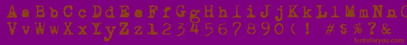 フォントDraconiantypewritter001 – 紫色の背景に茶色のフォント