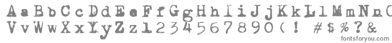 フォントDraconiantypewritter001 – 白い背景に灰色の文字