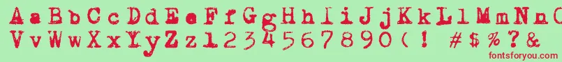Draconiantypewritter001-fontti – punaiset fontit vihreällä taustalla