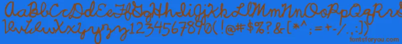 フォントUcuCharlesScript – 茶色の文字が青い背景にあります。