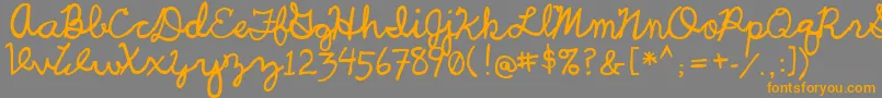 UcuCharlesScript Font – Orange Fonts on Gray Background