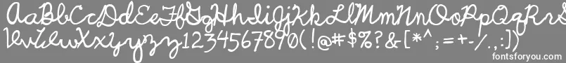 UcuCharlesScript-Schriftart – Weiße Schriften auf grauem Hintergrund
