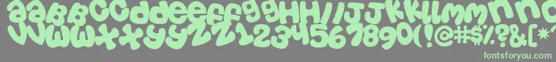 More about CasualTossed Font CasualTossed Font – Green Fonts on Gray Background