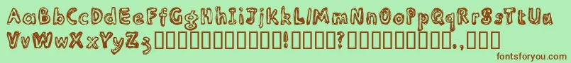 Inlinesr Font – Brown Fonts on Green Background