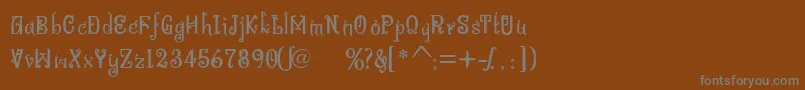 フォントBitlingniksmusicalNormal – 茶色の背景に灰色の文字