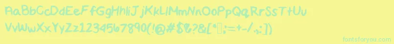 Maddiescript Font – Green Fonts on Yellow Background