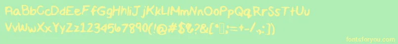 Maddiescript Font – Yellow Fonts on Green Background