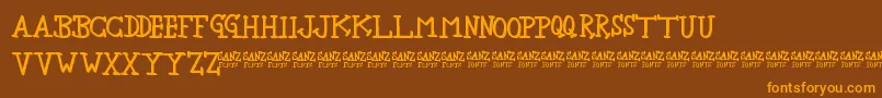 NewbieSherif-Schriftart – Orangefarbene Schriften auf braunem Hintergrund