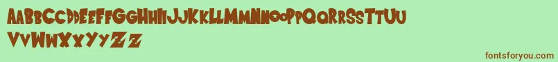 SaiyanSans Font – Brown Fonts on Green Background