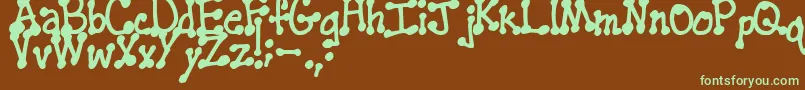 PenstitchingNormal Font – Green Fonts on Brown Background