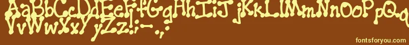 PenstitchingNormal Font – Yellow Fonts on Brown Background