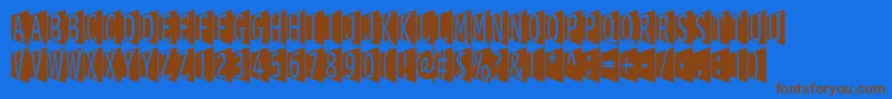 Stageglyphs Font – Brown Fonts on Blue Background