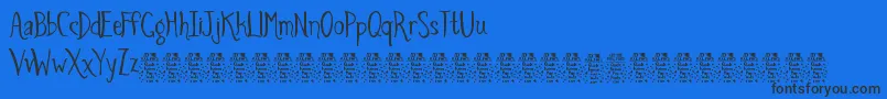 SpidersandsparrowsDemo Font – Black Fonts on Blue Background