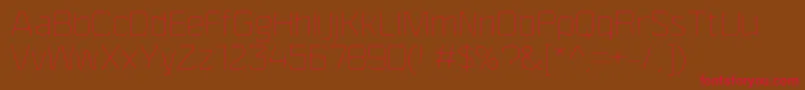 F4aagentrigidthin Font – Red Fonts on Brown Background