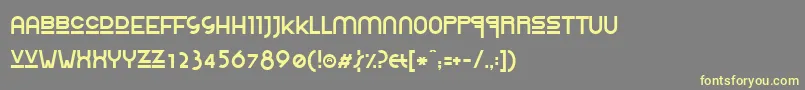 Шрифт RolingaRennerExtravaganza – жёлтые шрифты на сером фоне