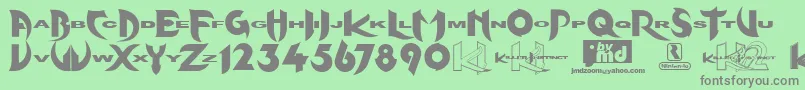 Kinifed ffy Font – Gray Fonts on Green Background