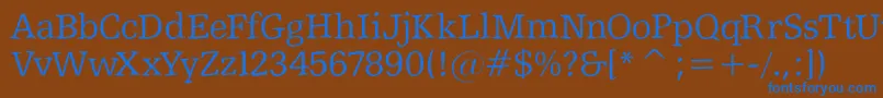 Shakeyslabserif-fontti – siniset fontit ruskealla taustalla