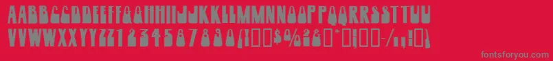 Fonte Woogiedisplayoutlinecapsssk – fontes cinzas em um fundo vermelho