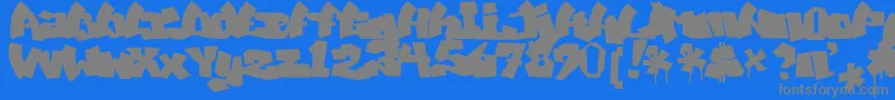 Więcej informacji o czcionce MawnsGraffitiFilled Czcionka MawnsGraffitiFilled – szare czcionki na niebieskim tle