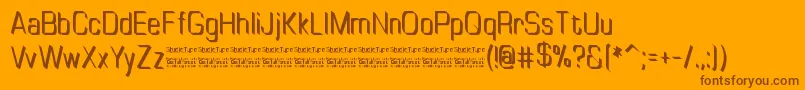 Fonte TinyplateRegularDemo – fontes marrons em um fundo laranja