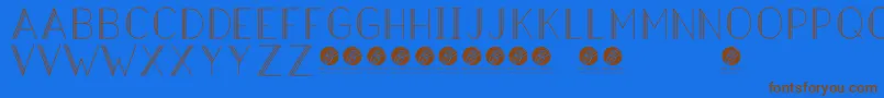 HazeldecolightRegular-Schriftart – Braune Schriften auf blauem Hintergrund