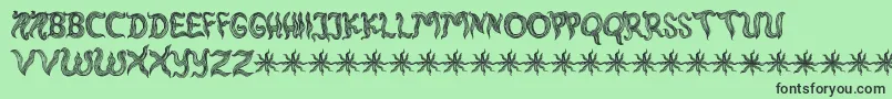 フォントRambutKusut – 緑の背景に黒い文字