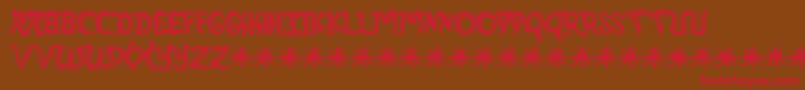 RambutKusut Font – Red Fonts on Brown Background