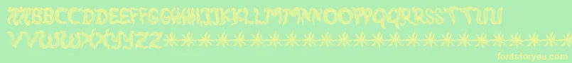 RambutKusut-Schriftart – Gelbe Schriften auf grünem Hintergrund
