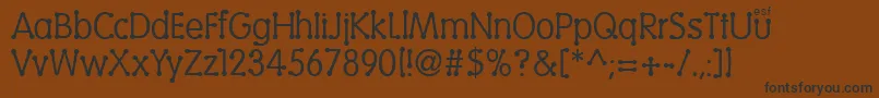Vantrel Font – Black Fonts on Brown Background