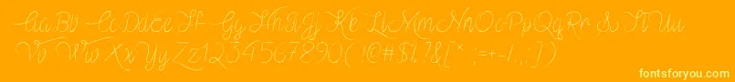 VampireHeartOtf-Schriftart – Gelbe Schriften auf orangefarbenem Hintergrund