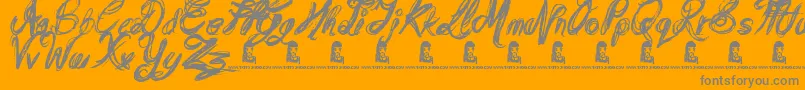Czcionka MessyScript – szare czcionki na pomarańczowym tle