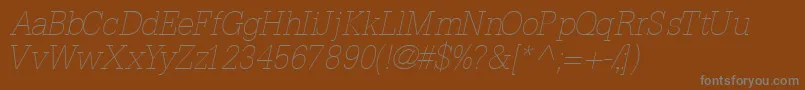 InstallationlightsskItalic-Schriftart – Graue Schriften auf braunem Hintergrund