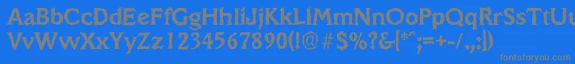 VeracruzrandomBold-fontti – harmaat kirjasimet sinisellä taustalla