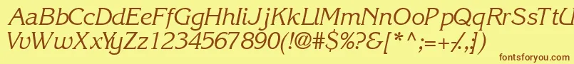 フォントIntuitionsskItalic – 茶色の文字が黄色の背景にあります。