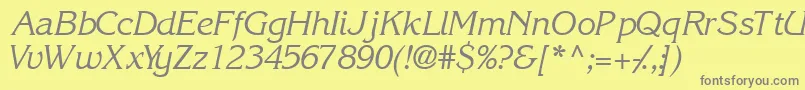 フォントIntuitionsskItalic – 黄色の背景に灰色の文字