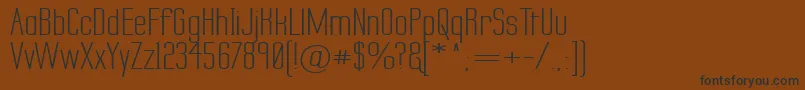 LabtopSecundoWide Font – Black Fonts on Brown Background