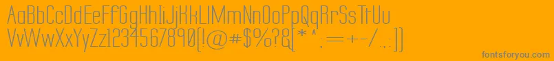 Fonte LabtopSecundoWide – fontes cinzas em um fundo laranja