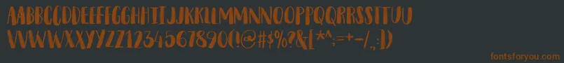 SnubnoseDemo Font – Brown Fonts on Black Background
