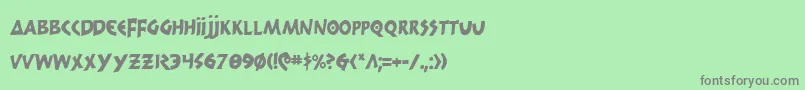 フォント300TrojansCondensed – 緑の背景に灰色の文字