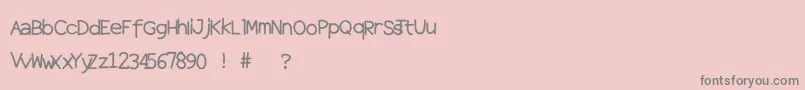 Weitere Informationen zur Halftones-Schriftart Halftones-Schriftart – Graue Schriften auf rosa Hintergrund
