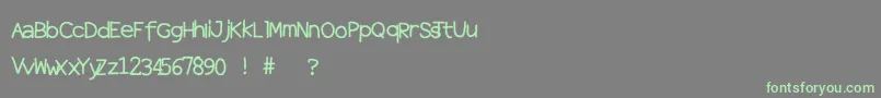 Halftones-Schriftart – Grüne Schriften auf grauem Hintergrund