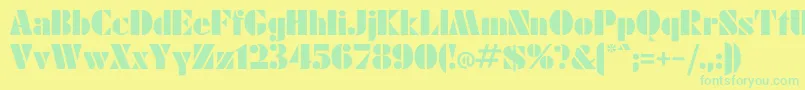 Einmal Font – Green Fonts on Yellow Background